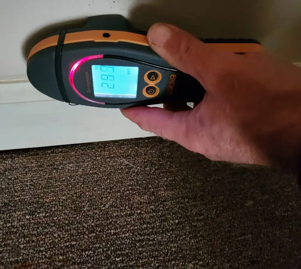 Moisture detection at baseboard during Sewage Cleanup & Sanitation in Bridgeport